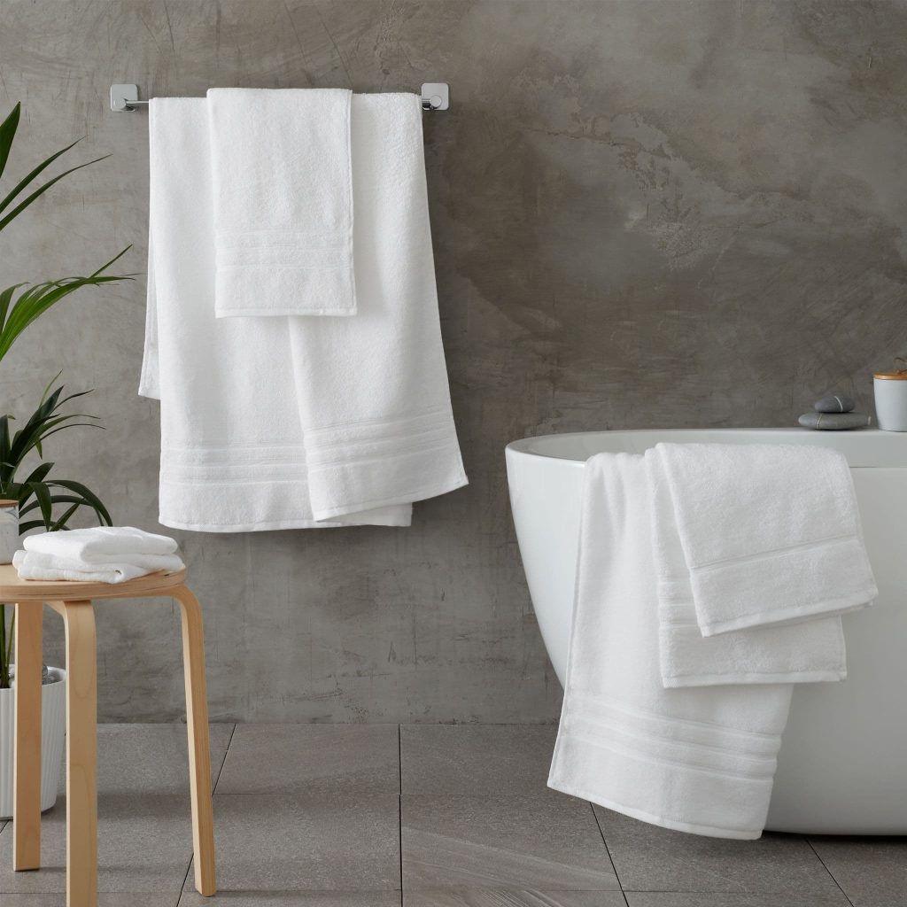 catherine lansfield bath towel bales in a bathroom